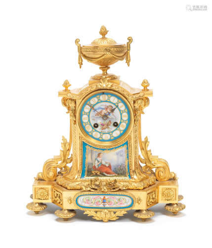 A late 19th century French gilt bronze and Sèvres style porcelain mantel clock together with a pair of similar garniture candlesticks the dial signed Henri Marc, Paris, the movement Vincenti & Cie (3)