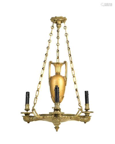 An early 19th century gilt bronze three-light colza chandelier