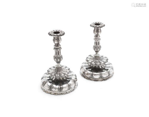 probably Dutch, with a later unidentified mark  (2) A pair of 17th century silver candlesticks