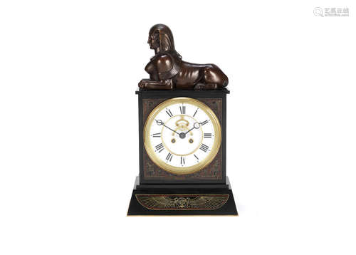 the backplate stamped G & C A late 19th Century French Egyptian revival patinated bronze and black Belgium marble mantle clock