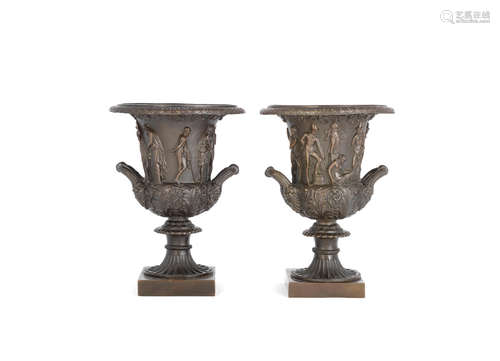 A pair of late 19th century French patinated bronze garniture urns