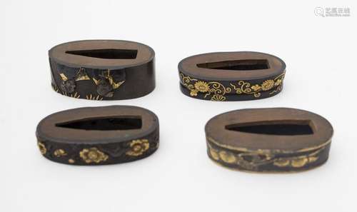 Group of eight fuchi and three kozuka sheaths, Japan, Meiji period Brass and copper. The fuchi are