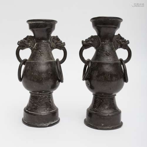 Pair of bronze vases Dragon pattern on the handles and Lei Wen, two rings on the handles. One of