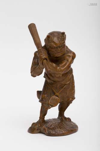 Large boxwood okimono Representing the imp Oni, holding a club in his hands and wearing a gourd and