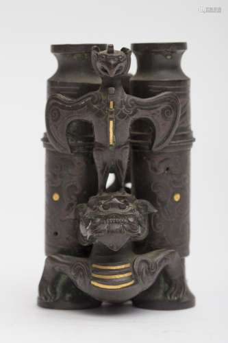 Double cylindrical vase Bronze, featuring a taotie, phoenix, dragon, and imperial guardian lion.