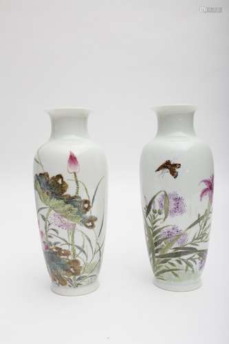 Pair of vases featuring lotuses and irises White porcelain, marked with a calligraphy on the side.