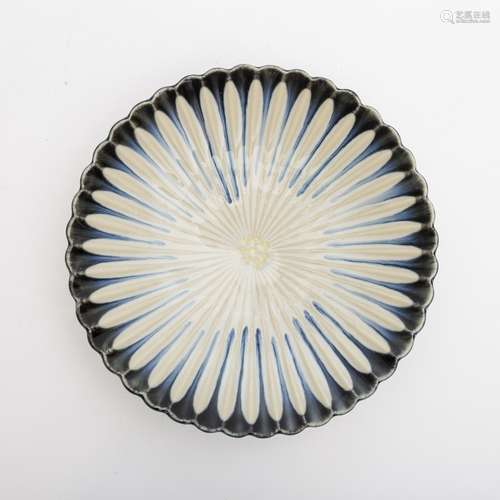 Shallow chrysanthemum cup Scalloped arita porcelain with blue and black glaze. Japan, Taisho