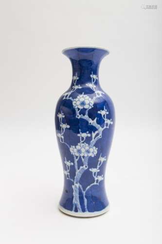 Baluster vase featuring cherry trees on a blue ground Porcelain. Concentric circles mark under the