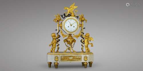 Paris, ca 1785 Louis XVI clock featuring a griffon Weathered gilded bronze and white marble.