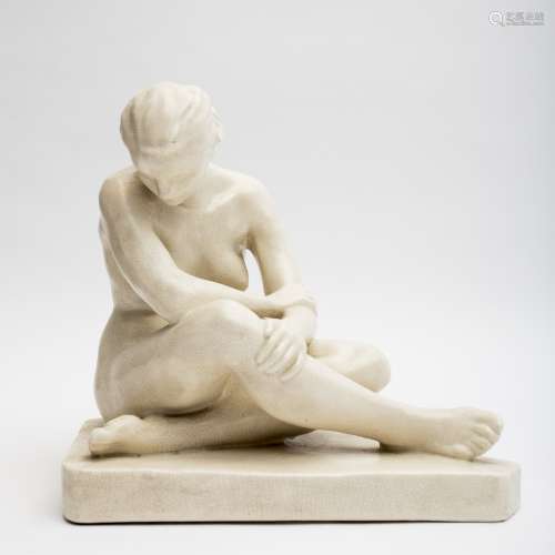 Paule Bisman (1897-1973) Thoughtful White craquelure ceramic sculpture depicting a female nude.