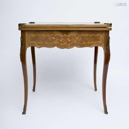 Game table Louis XV-style with marquetry and gilded bronze. Opens with one side drawer, surface
