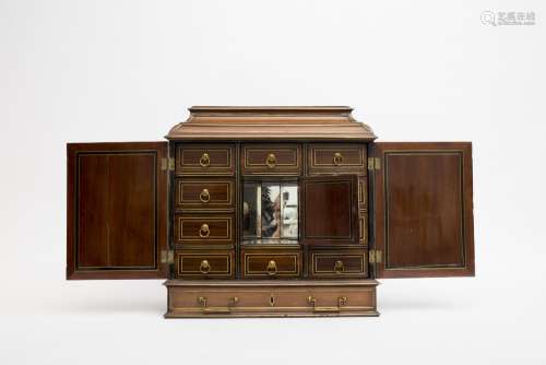 Table cabinet Mahogany, mahogany veneer, and gilded brass inlays. Opens at the front, one drawer