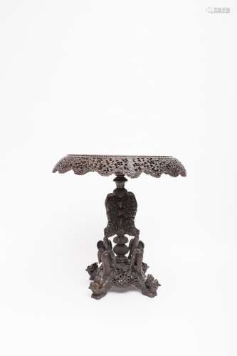 Indo-Portuguese work, 19th century Side table Carved rosewood decorated with rinceaux, stylized