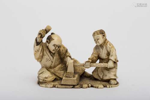 Okimono Ivory, representing a blacksmith and his apprentice shaping the blade of a katana. Seal