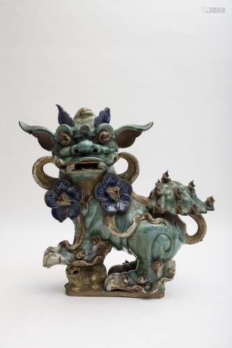 Female Chinese guardian lion Earthenware with green, blue, yellow and white glaze. China, 19th