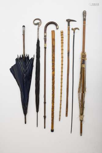 Lot of five canes and three umbrellas One umbrella from the Betaille house (20 Rue Royale in