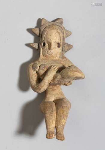 Figurine féminine assise, représentant une materni...;