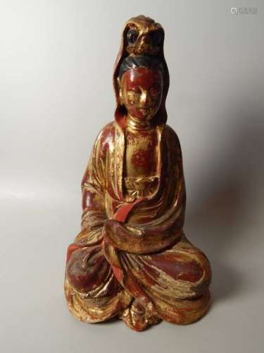 Kwanin, en bois laqué. Chine, XIXe siècle. H :32cm...;