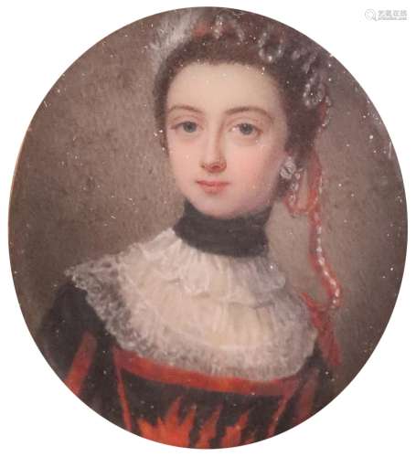 λ British School late 18th Century Portrait miniature of a lady, bust length, wearing pearls in