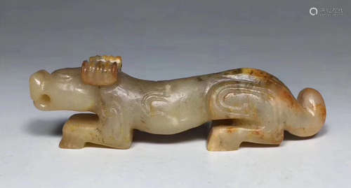 A HETIAN JADE CARVED TIGER SHAPED PENDANT