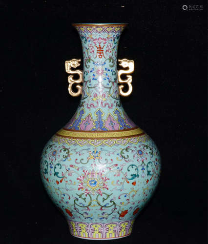 A FAMILLE ROSE GILD WRAPPED LOTUS PATTERN VASE