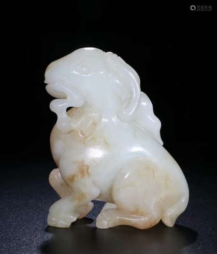 A HETIAN JADE CARVED DOG SHAPED PENDANT