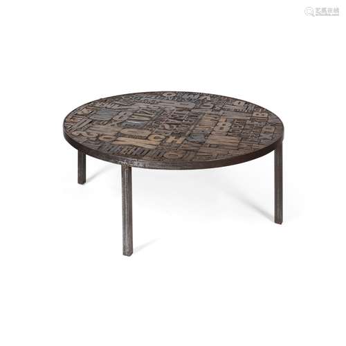 NOVELTY STEEL PRINTER'S BLOCK COFFEE TABLEMODERN the circular top fitted with an assortment of