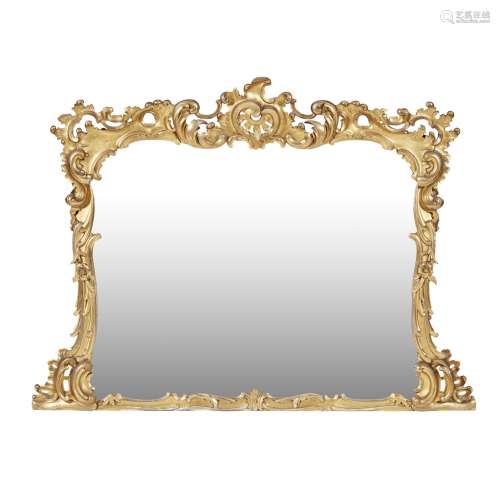VICTORIAN GILTWOOD OVERMANTEL MIRROR19TH CENTURY in the Rococo style, the shaped arched mirror plate