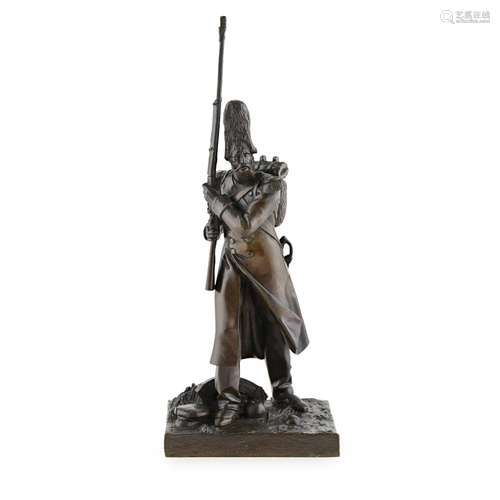 FRENCH BRONZE FIGURE OF A GRENADIER19TH CENTURY dark brown patina, raised on a naturalistic square