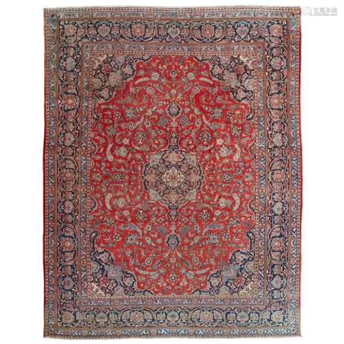 KASHAN CARPETCENTRAL PERSIA, LATE 19TH/EARLY 20TH CENTURY the red field with indigo and ivory