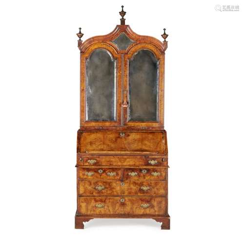 GEORGE I WALNUT BUREAU BOOKCASECIRCA 1720 the moulded arched cornice mounted with turned finials and