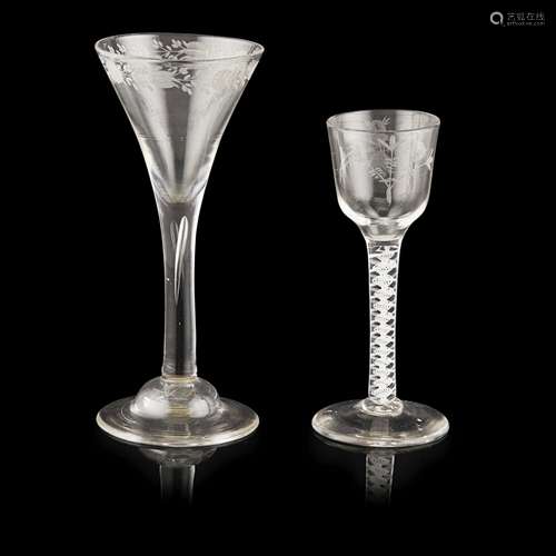 TWO GEORGIAN ENGRAVED WINE GLASSESMID-18TH CENTURY comprising a glass with an ogee bowl engraved