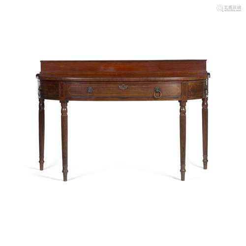 REGENCY BOWFRONT MAHOGANY SERVING TABLE, IN THE MANNER OF GILLOWSEARLY 19TH CENTURY the top with a