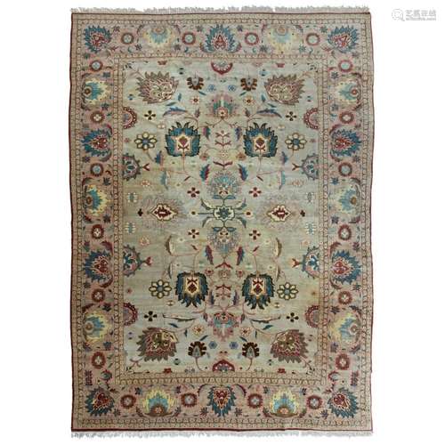 ZIEGLER STYLE CARPETLATE 20TH CENTURY the pale blue field with allover stylised palmette and foliate