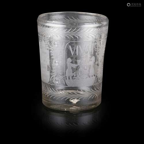 LARGE BOHEMIAN ENGRAVED TUMBLERCIRCA 1725-50 of slightly tapering form, wheel-engraved with four