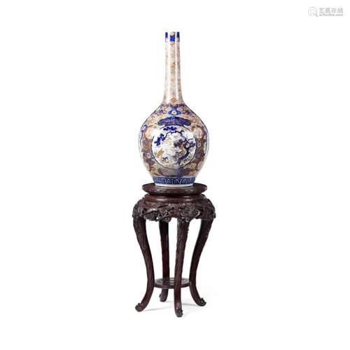 LARGE JAPANESE IMARI BOTTLE VASE AND CARVED HARDWOOD STAND19TH CENTURY the vase decorated with