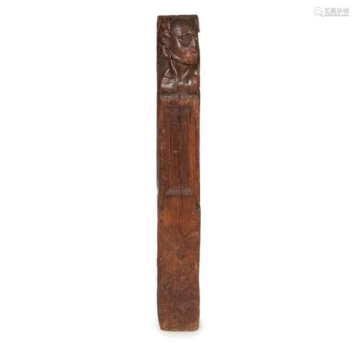 CARVED OAK ROOF BEAM16TH/17TH CENTURY the terminal carved with a man's head131cm high
