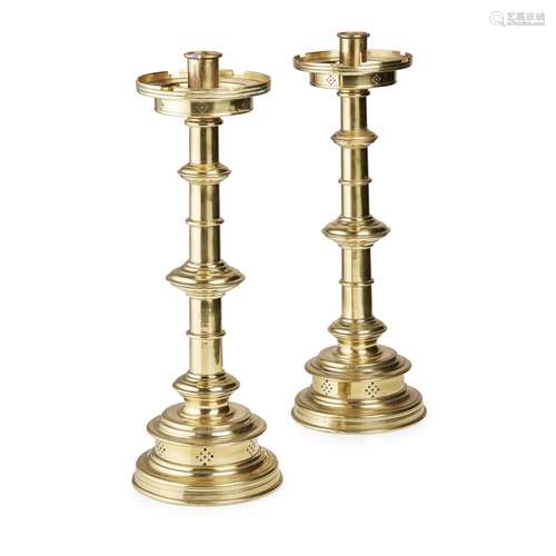 PAIR OF DUTCH BRASS CANDLESTICKS18TH/ EARLY 19TH CENTURY with pierced shallow circular drip trays