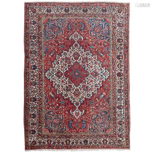 LARGE BAKHTIARI CARPETWEST PERSIA, EARLY 20TH CENTURY the brick red field with ivory and salmon pink