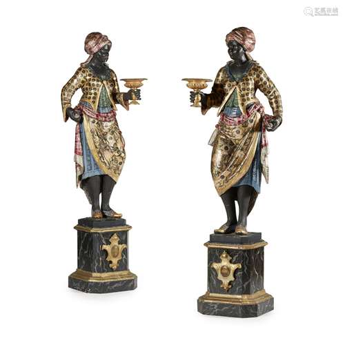 PAIR OF POLYCHROME, GILT AND SILVERED BLACKAMOOR FIGURESFIRST HALF 19TH CENTURY the carved wood