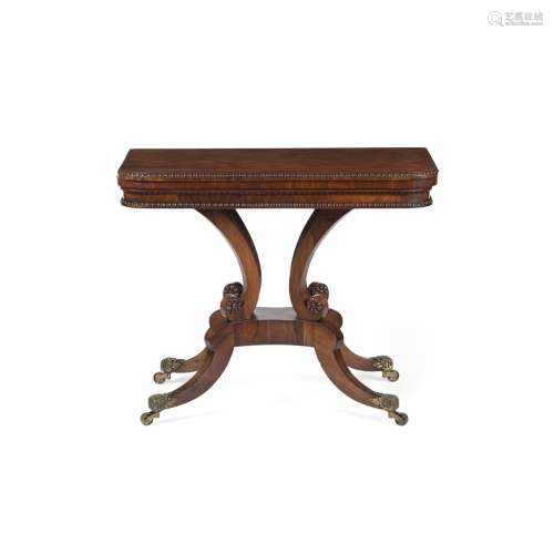 REGENCY STYLE ROSEWOOD CARD TABLE19TH CENTURY the D shaped fold-over top with a bead moulded edge,