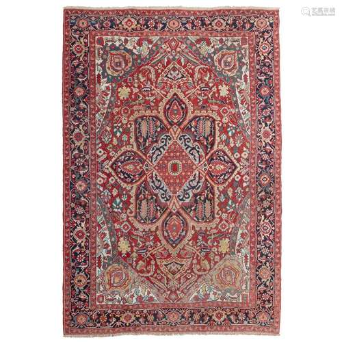 HERIZ CARPETNORTHWEST PERSIA, EARLY 20TH CENTURY the red field with large indigo, blue and red