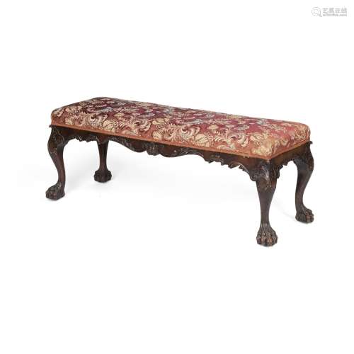 EDWARDIAN CHIPPENDALE STYLE MAHOGANY LONG STOOLEARLY 20TH CENTURY the long padded seat covered in