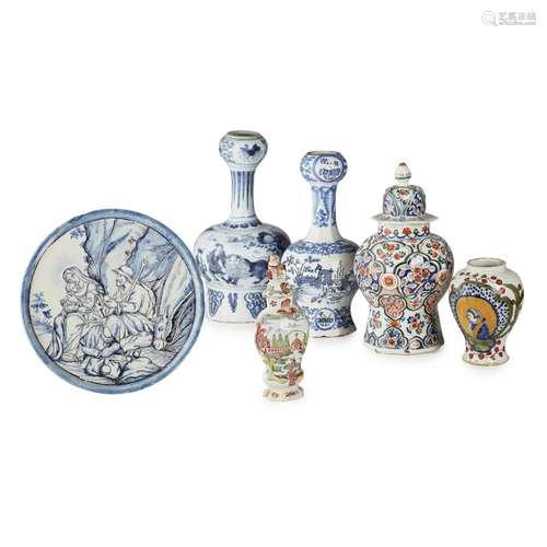 GROUP OF CONTINENTAL DELFTWARE AND FAIENCE18TH AND 19TH CENTURY comprising a blue and white footed