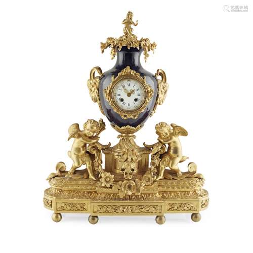 LARGE FRENCH GILT BRONZE AND PORCELAIN MANTEL CLOCK, JAPY FRERES19TH CENTURY surmounted by a