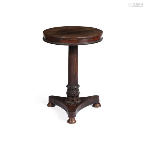 LATE REGENCY ROSEWOOD LAMP TABLEEARLY 19TH CENTURY the circular top above a bead moulded frieze,