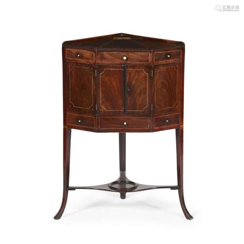 GEORGE III MAHOGANY CORNER WASHSTAND18TH CENTURY the galleried hinged top opening to reveal a