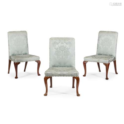 THREE GEORGE II UPHOLSTERED SIDE CHAIRSEARLY 18TH CENTURY the rectangular backs and wide seats in