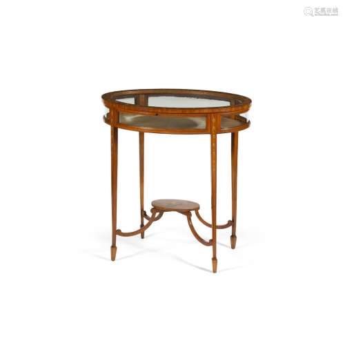 EDWARDIAN STAINWOOD PAINTED BIJOUTERIE TABLEEARLY 20TH CENTURY the oval hinged and glazed top