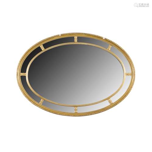 GILTWOOD OVAL OVERMANTEL MIRRORLATE 19TH CENTURY the central mirror plate enclosed by margin